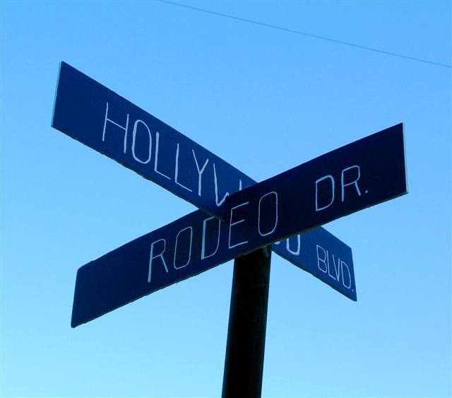 Hollywood Lies – street intersection sign 
											– Suzanne Lupo