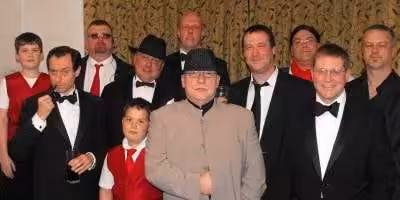 People in costume playing our Casino Fatale murder mystery game.