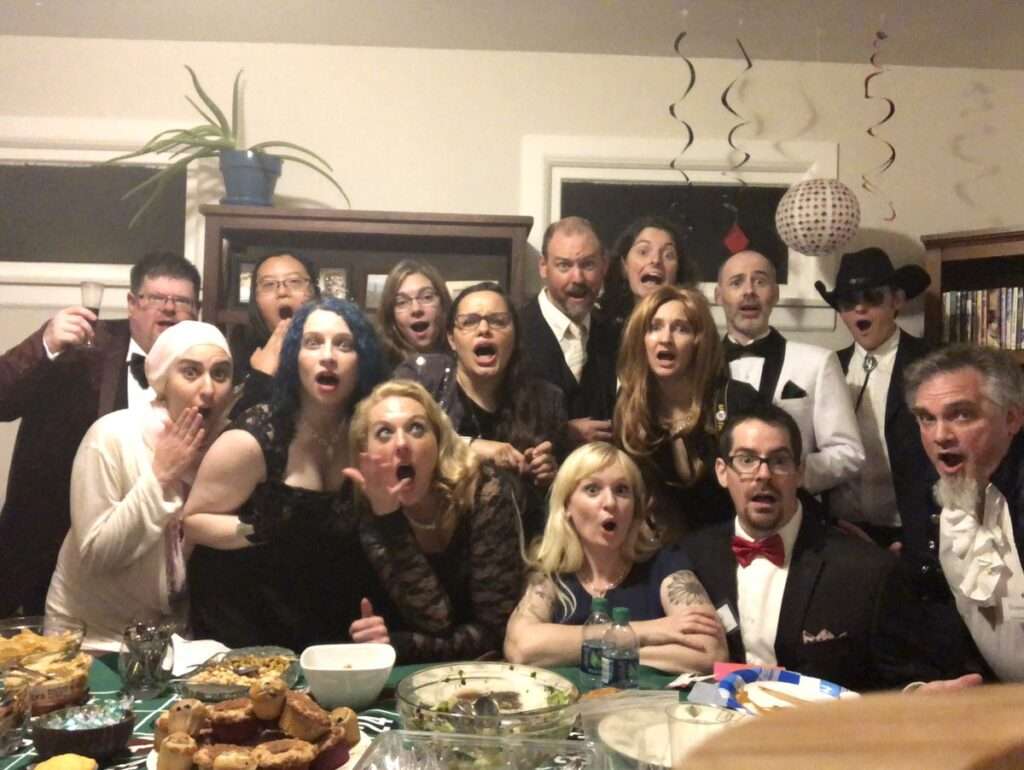Players in costume at a blackjack table playing our Casino Fatale murder mystery game