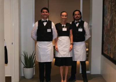 The hosts - dressed as staff