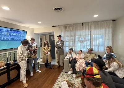 People playing our Death at the Derby murder mystery game.