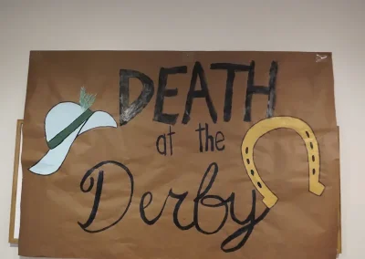 Death at the Derby signage