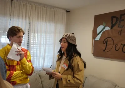 People playing our Death at the Derby murder mystery game.