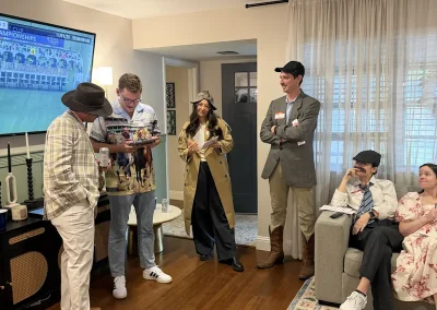 People playing our Death at the Derby murder mystery game.