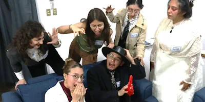 Playing our ghostly A Haunting in Hartwick murder mystery game.