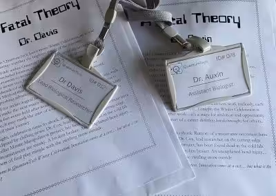 Character sheets and nametags from A Fatal Theory