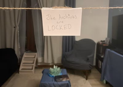 The archives are closed - a sign for The Deadly Library